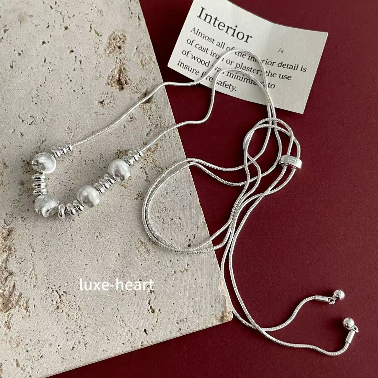 S925 sterling silver cat's eye pull-out snake bone necklace/sweater chain for women
