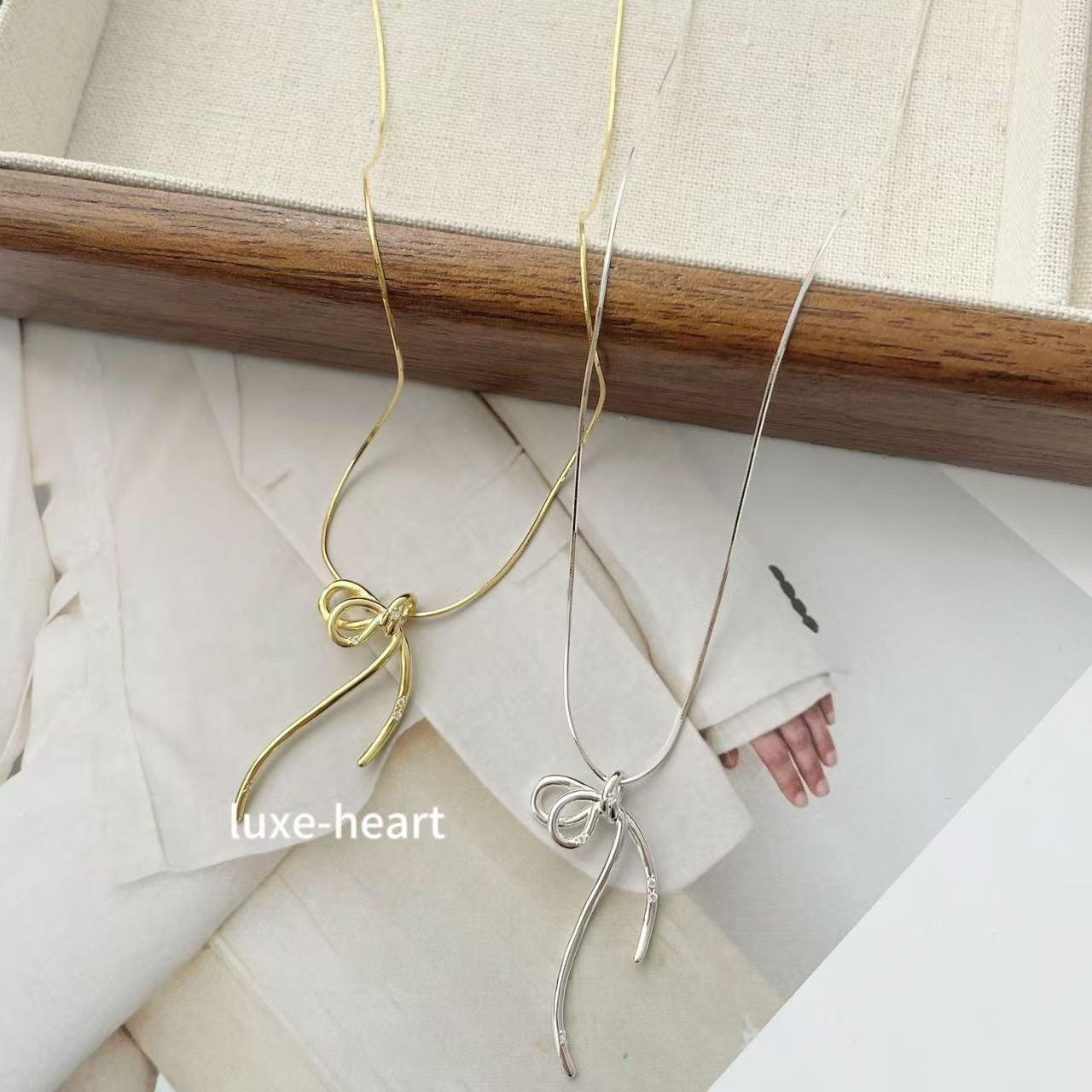 Niche design S925 silver line bow necklace